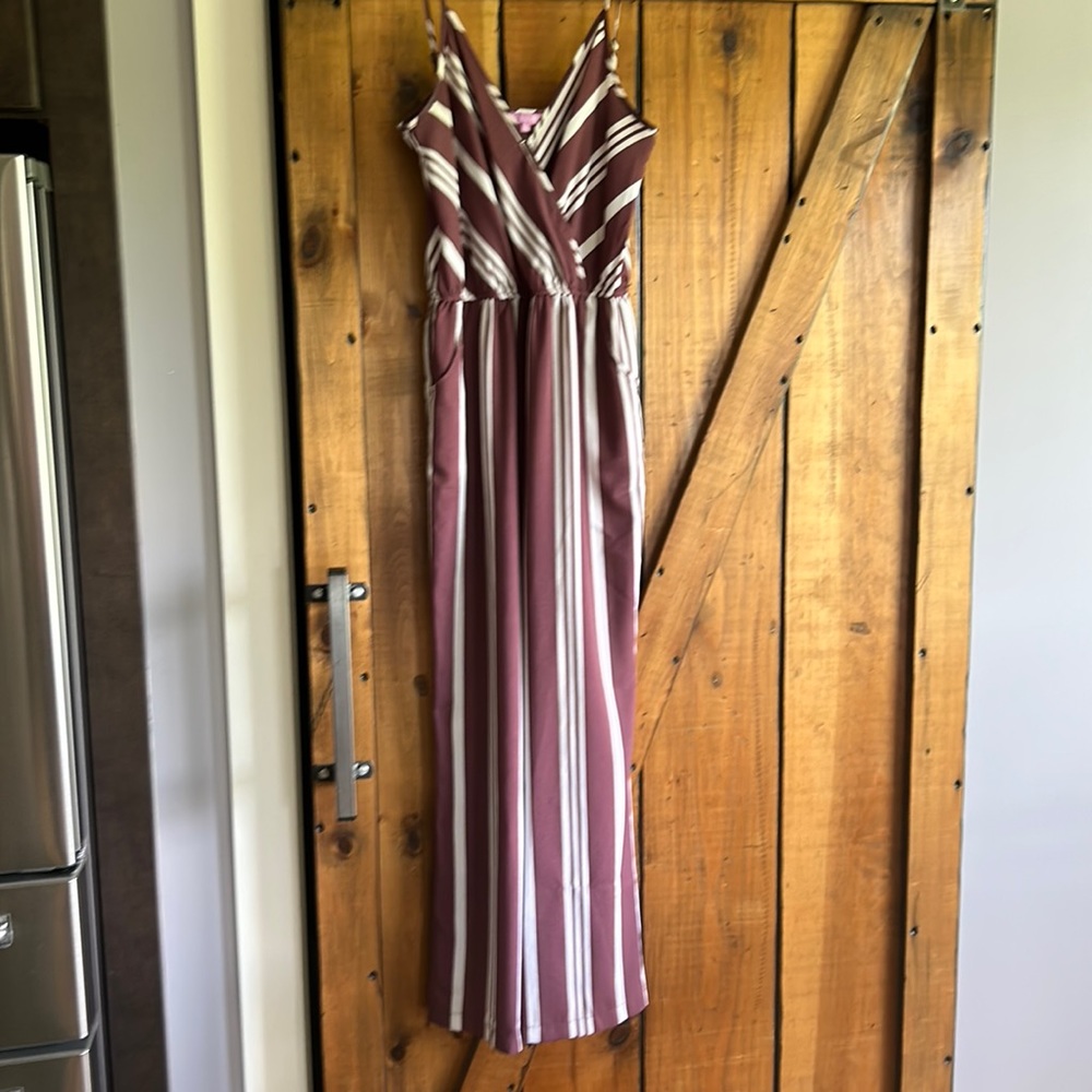 Ladies jumpsuit size medium in good condition   Rosey maroon with white stripes